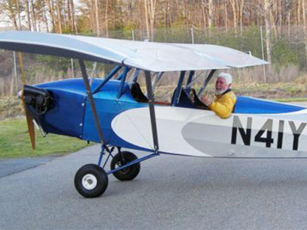 Pilot in small airplane ready for takeoff