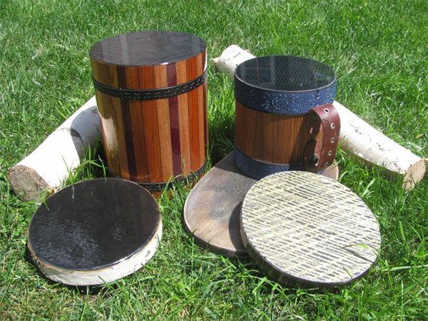 different sized drums on a lawn