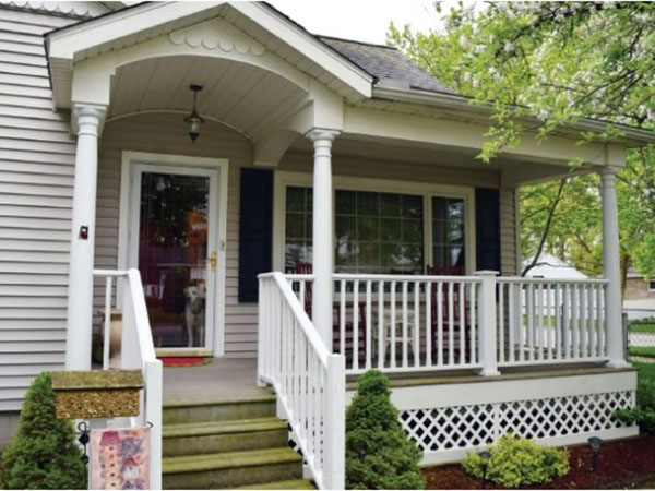 Front door of a home with a porch