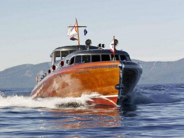large wooden boat on clear waters